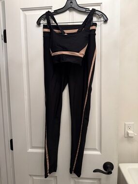 The Upside Black Leggings and Crop Top with Nude Trim
